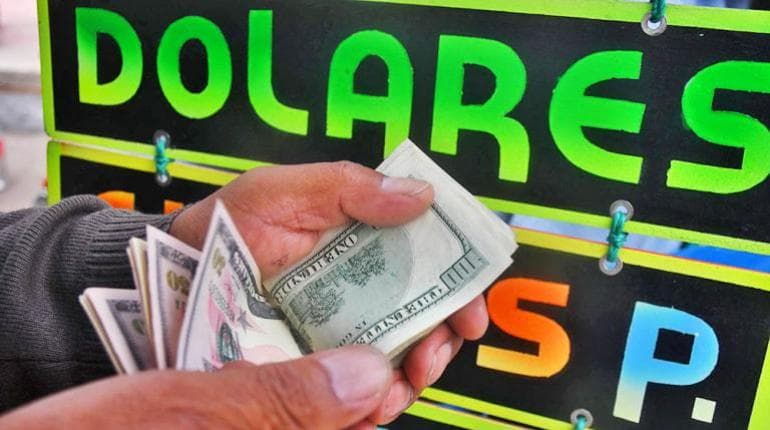 EL DÓLAR PARALELO BAJA HASTA BS 14,60 PARA LA VENTA Y BS 14 PARA LA COMPRA